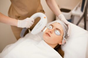 Young beautiful woman on beauty cosmetology procedure